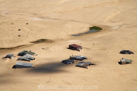 aerial;aerial-photo;aerial-photograph;aerial-photographs;aerial-photography;aerial-photos;aerial-view;aerial-views;aerials;Australasia;Australia;Australian;beach;beaches;coast;coastal;corrugated-iron-shacks;corrugated-steel-huts;fishing-huts;fishing-shacks;hut;huts;N.S.W.;New-South-Wales;Newcastle;NSW;sand;sandy;shack;shacks;shanty-town;Stockton-Beach;Stockton-Dunes;Stockton-Sand-Dunes;Tin-City;village