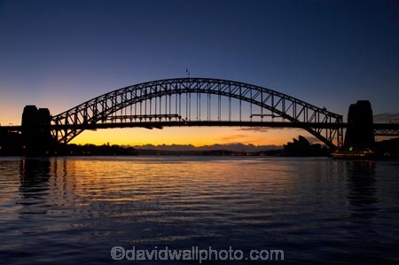 architectural;architecture;Australasia;Australia;Bennelong-Point;break-of-day;bridge;bridges;calm;dawn;dawning;daybreak;first-light;icon;iconic;icons;landmark;landmarks;morning;N.S.W.;New-South-Wales;NSW;Opera-House;orange;placid;quiet;reflection;reflections;serene;smooth;still;structure;structures;sunrise;sunrises;sunup;Sydney;Sydney-Harbor;Sydney-Harbor-Bridge;Sydney-Harbour;Sydney-Harbour-Bridge;Sydney-Opera-House;tranquil;twilight;water