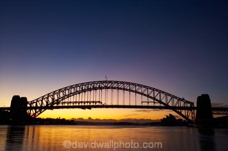 architectural;architecture;Australasia;Australia;Bennelong-Point;break-of-day;bridge;bridges;calm;dawn;dawning;daybreak;first-light;icon;iconic;icons;landmark;landmarks;morning;N.S.W.;New-South-Wales;NSW;Opera-House;orange;placid;quiet;reflection;reflections;serene;smooth;still;structure;structures;sunrise;sunrises;sunup;Sydney;Sydney-Harbor;Sydney-Harbor-Bridge;Sydney-Harbour;Sydney-Harbour-Bridge;Sydney-Opera-House;tranquil;twilight;water