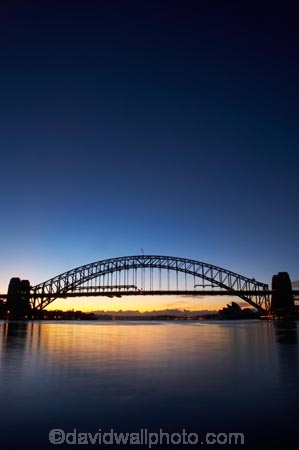 architectural;architecture;Australasia;Australia;Bennelong-Point;break-of-day;bridge;bridges;calm;dawn;dawning;daybreak;first-light;icon;iconic;icons;landmark;landmarks;morning;N.S.W.;New-South-Wales;NSW;Opera-House;orange;placid;quiet;reflection;reflections;serene;smooth;still;structure;structures;sunrise;sunrises;sunup;Sydney;Sydney-Harbor;Sydney-Harbor-Bridge;Sydney-Harbour;Sydney-Harbour-Bridge;Sydney-Opera-House;tranquil;twilight;water