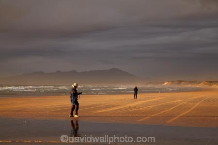 Australasian;Australia;Australian;beach;beaches;black-cloud;black-clouds;black-sky;cloud;cloudy;coast;coastal;coastline;dark-cloud;dark-clouds;dark-sky;gray-cloud;gray-clouds;gray-sky;grey-cloud;grey-clouds;grey-sky;Island-of-Tasmania;late-light;Ocean-Beach;people;person;photographer;photographers;rain-cloud;rain-clouds;sand;sandy;shore;shoreline;State-of-Tasmania;storm;storm-clouds;storms;stormy;Strahan;Tas;Tasmania;The-West;West-Tasmania;Western-Tasmania