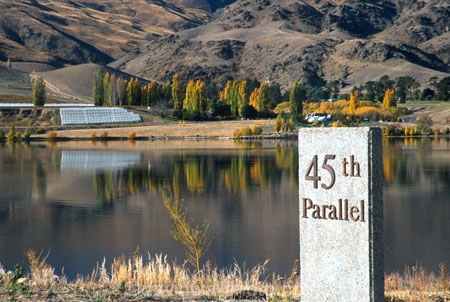 monument;marker;site;location;locater;marked;stone;carved;lakes;reflection;calm;schist;landscape