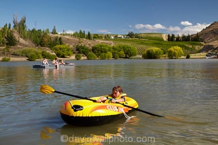 Bannockburn;Bannockburn-Inlet;boat;boats;boy;boys;Central-Otago;central-otago-vineyard;central-otago-vineyards;central-otago-wineries;central-otago-winery;child;children;country;countryside;inflatable-boat;inflatable-boats;inflatable-rubber-boat;inflatable-rubber-boats;irb;irbs;kid;kids;lake;Lake-Dunstan;lakes;lifejacket;lifejackets;little-boy;little-boys;N.Z.;New-Zealand;NZ;Otago;play;playing;raft;row;row-boat;row-boats;rowing;S.I.;SI;South-Is.;south-island;summer;vineyard;vineyards;water;wineries;winery;yellow-boat;yellow-boats
