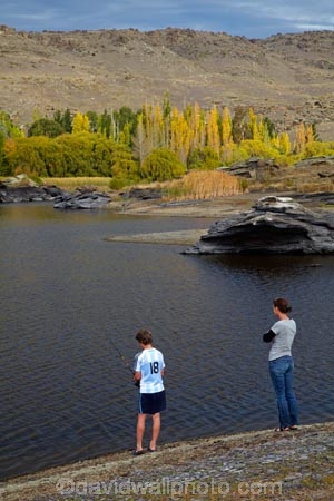 Alexandra;autuminal;autumn;autumn-colour;autumn-colours;autumnal;boy;boys;Butchers-Dam;Butchers-Dam;Central-Otago;color;colors;colour;colours;dam;dams;deciduous;fall;fisher;fisherman;fishermen;fishing;gold;golden;lake;lakes;leaf;leaves;model-release;model-released;N.Z.;New-Zealand;NZ;Otago;S.I.;season;seasonal;seasons;SI;South-Is;South-Island;Sth-Is;tree;trees;yellow