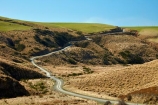 countryside;dusty;gravel-road;gravel-roads;Lake-Mahinerangi;lawrence;metal-road;metal-roads;metalled-road;metalled-roads;N.Z.;New-Zealand;NZ;Otago;road;roads;rural;S.I.;SI;South-Is;South-Island;Sth-Is;tussock;Tussocks;unpaved-road;unpaved-roads