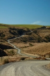 countryside;dusty;gravel-road;gravel-roads;Lake-Mahinerangi;lawrence;metal-road;metal-roads;metalled-road;metalled-roads;N.Z.;New-Zealand;NZ;Otago;road;roads;rural;S.I.;SI;South-Is;South-Island;Sth-Is;tussock;Tussocks;unpaved-road;unpaved-roads