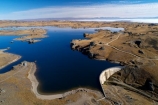 aerial;Aerial-drone;Aerial-drones;aerial-image;aerial-images;aerial-photo;aerial-photograph;aerial-photographs;aerial-photography;aerial-photos;aerial-view;aerial-views;aerials;arch;arch-dam;arch-dams;back-country;backcountry;cabin;cabins;Central-Otago;concrete-arch-dam;concrete-dam;dam;dams;Drone;Drones;fishing-cabins;fishing-camp;fishing-huts;geological;geology;high-altitude;high-country;highcountry;highlands;hut;huts;irrigation-dam;irrigation-lake;Maniototo;N.Z.;New-Zealand;NZ;Old-Dunstan-Road;Old-Dunstan-Track;Old-Dunstan-Trail;Otago;Poolburn;Poolburn-Dam;Poolburn-Lake;Poolburn-Reservoir;remote;remoteness;rock;rock-formation;rock-formations;rock-outcrop;rock-outcrops;rock-tor;rock-torr;rock-torrs;rock-tors;rocks;Rough-Ridge;S.I.;SI;South-Is;South-Island;stone;unusual-natural-feature;unusual-natural-features;uplands
