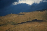 back-country;backcountry;black-cloud;black-clouds;Cairnmuir-Mountains;Central-Otago;cloud;cloudy;dark-cloud;dark-clouds;Dunstan-Mountains;grey-cloud;grey-clouds;high-altitude;high-country;highcountry;highlands;late-light;N.Z.;New-Zealand;NZ;Otago;rain-cloud;rain-clouds;remote;remoteness;S.I.;SI;South-Island;storm;storm-clouds;storms;stormy;tussock;tussock-grass;tussocks;uiplands;upland;uplands