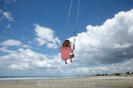 10-year-old;10-years-old;9-year-old;9-years-old;beach;beaches;child;children;coast;coastal;Coromandel;Coromandel-Peninsula;fun;girl;girls;happy;joy;kid;kids;kiwi-icon;kiwi-icons;kiwiana;little-girl;little-girls;N.I.;N.Z.;New-Zealand;NI;nine-year-old;nine-years-old;North-Is;North-Is.;North-Island;NZ;outdoor;outside;people;person;play;playing;Pohutukawa-Tree;Pohutukawa-Trees;rope-swing;rope-swings;shore;summer;swing;swinging;swings;ten-year-old;ten-years-old;Waihi-Beach;Waikato;young-girl;young-girls