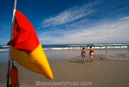 color;colour;colors;colours;red;yellow;shore;beach;coastline;sand;sandy;swimmers;paddlers;bathers;beachlife;surf;swim;togs;people;safety;flag