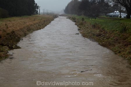 bad-weather;brook;brooks;country;countryside;creek;creeks;deluge;dike;dikes;dirty;dirty-water;Dunedin;dyke;dykes;embankment;embankments;flood;flood-bank;flood-banks;flood-water;flood-waters;floodbank;floodbanks;flooding;floods;floodwater;floodwaters;flow;high-water;inundate;levee;levees;meadow;meadows;Mosgiel;N.Z.;New-Zealand;NZ;on-flood;Otago;paddock;paddocks;pasture;pastures;rural;S.I.;SI;Silver-Stream;Silverstream;South-Is.;South-Island;stopbank;stopbanks;stream;streams;swollen-river;Taieri;Taieri-Plain;Taieri-Plains;water;waterway;waterways;weather;wet