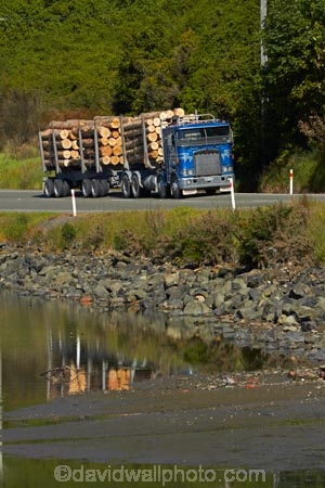 articulated-lorries;articulated-lorry;articulated-truck;articulated-trucks;bulk;calm;Dunedin;Dynes-Transport;Dynes-Transport;export;export-logs;exporting;exports;forestry;forestry-industry;heavy-haulage;industrial;industry;Juggernaut;Juggernauts;Kenworth;Kenworths;log;log-hauler;log-haulers;log-lorries;log-lorry;log-truck;log-trucks;logging;logging-lorries;logging-lorry;logging-truck;logging-trucks;logs;lorries;lorry;lumber;N.Z.;New-Zealand;NZ;Otago;Otago-Harbour;pine;pine-tree;pine-trees;pines;pinus-radiata;placid;Port-Chalmers;Pt-Chalmers;quiet;Ravensbourne-Rd;Ravensbourne-Road;reflected;reflection;reflections;rig;rigs;S.I.;semi;semitrailer;semitrailers;serene;SI;smooth;South-Is;South-Is.;South-Island;St-Leonards;Sth-Is;still;stockpile;stockpiles;timber;timber-industry;tractor-trailer;tractor-trailers;trade;tranquil;transport;transportation;tree;tree-trunk;tree-trunks;trees;truck;trucks;water;wood