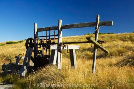 abandoned;Canton-Stamping-Battery;cog-wheels;cogs;crush;crusher;deserted;discovered;gold;gold-fields;gold-mining;gold-rush;gold-towns;Goldfields;goldminers;goldmining;goldrush;heritage;hills;historic;historical;history;Lake-Mahinerangi;machine;machinery;miners;mountains;New-Zealand;old;Otago;posts;quartz;quartz-crushing;quartz-reefs;ruin;rust;rusted;rusty;shaft;South-Island;stamp;stamper;stamping;support;tradition;traditional;wooden-posts
