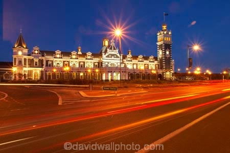 1906;architecture;building;buildings;car-lights;clock;clock-tower;clock-towers;Dunedin;Dunedin-Railway-Station;dusk;evening;Flemish-Renaissance-style;flood-light;flood-lights;flood-lit;freight;George-A-Troup;Gingerbread-George;heritage;historic;historic-building;historic-buildings;Historic-Railway-Station;historical;historical-building;historical-buildings;history;light;light-trails;lights;N.Z.;New-Zealand;night;night-night-time;night-time;night_time;nightfall;nighttime;NZ;old;Otago;platform;platforms;rail;rail-station;rail-stations;railroad;railroads;rails;railway;Railway-Station;railway-stations;railways;S.I.;SI;South-Island;sunset;sunsets;tail-lights;track;tracks;tradition;traditional;traffic;train;train-station;train-stations;trains;transport;transportation;twilight