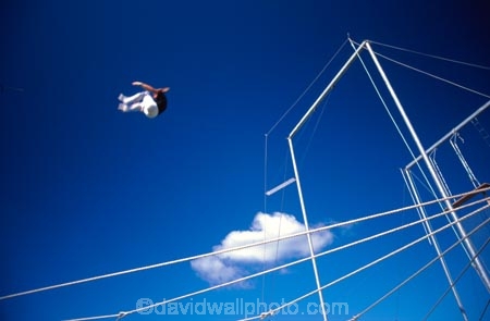 acrobat;acrobats;acrobatics;acrobatic;swing;gymnastics;gymnast;trapeze;air;airborne;fly;flying;practice;practicing;blue;sky;cloud;flip;spin