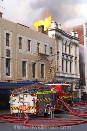 alight;brave;bravery;burn;burned;burning;burns;burnt;c.b.d.;catastrophe;catastrophes;cbd;courage;crane;danger;dangerous;destruction;disaster;disasters;dunedin;emergencies;emergency;emergency-worker;emergency-workers;extinguish;extinguising;fire;fire-engine;fire-engines;fire-fighter;fire-fighters;fire-insurance;fire-truck;fire-trucks;fire-unit;fire_engine;fire_engines;fire_fighter;fire_fighters;firefighter;firefighters;fireman;firemen;fires;firetruck;firetrucks;flamable;flame;flames;fume;fumes;hazard;hazardous;heat;high;high-up;hose;hoses;hosing;hot;industrial;industry;inferno;infernos;insurance;ladder;loss;losses;moray-place;negative-negative-concept;new-zealand;occupation;on-fire;pollute;pollution;profession;professions;risk;smoke;smokey;snorkel;snorkel-unit;south-island;spray;spraying;sprays;water