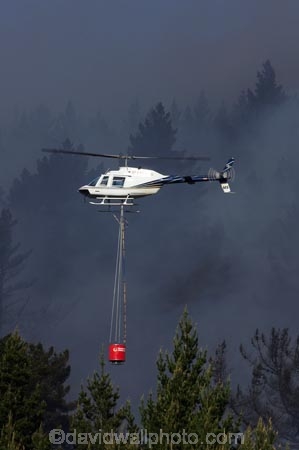 air-craft;aircraft;aircrafts;aviating;aviation;aviator;aviators;Bel-Jet-Ranger;Bel-Jet-Rangers;Bell-206B;Bell-Jetranger;Bell-Jetrangers;bucket;buckets;chopper;choppers;douse;Dunedin;emergency;fire;fire-fighters;fire-fighting;fire_fighting;firefighting;fires;flight;flights;fly;flyer;flyers;flying;Forest-Fire;Forest-Fires;Helicopter;Helicopters;Helicopters-Otago;Jet_ranger;Jet_rangers;monsoon-bucket;monsoon-buckets;N.Z.;New-Zealand;NZ;pilot;pilots;pine;pine-forest;pine-forests;pine-tree;pine-trees;pines;rotor;S.I.;SI;sky;smoke;smokey;South-Island;water-biuckets;water-bucket