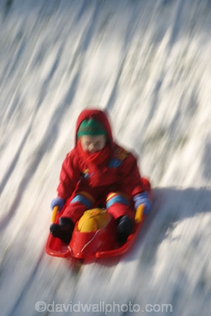 alone;child;childhood;color;colour;drag;dragging;effort;frtiction;fun;hood;hooded;lonely;movement;plastic;play;playing;pleasure;red;sled;sledding;sledge;sledging;slide;slipping;slope;snow;snowy;speed;speeding;success;tobogan;tow