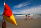 color;colour;colors;colours;red;yellow;shore;beach;coastline;sand;sandy;swimmers;paddlers;bathers;beachlife;surf;swim;togs;people;safety;flag