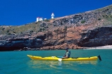 new-zealand;pilots-beach;kayaks;canoe;entrance;marine;coast;harbor;otago-peninsula;The-Heads;person;paddler;paddling;paddle