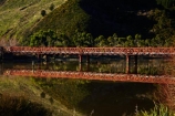 bridge;bridges;calm;Dunedin;Henley;Henley-Bridge;historic;historic-bridge;historic-bridges;historical;historical-bridge;historical-bridges;history;infrastructure;N.Z.;New-Zealand;NZ;old;Otago;placid;quiet;reflected;reflection;reflections;river;rivers;road-bridge;road-bridges;S.I.;serene;SI;smooth;South-Is;South-Island;still;Taieri-Plain;Taieri-Plains;Taieri-River;tradition;traditional;traffic-bridge;traffic-bridges;tranquil;transport;water