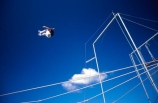 acrobat;acrobats;acrobatics;acrobatic;swing;gymnastics;gymnast;trapeze;air;airborne;fly;flying;practice;practicing;blue;sky;cloud;flip;spin