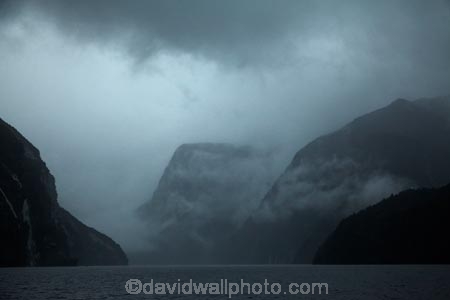 bad-weather;black-cloud;black-clouds;cloud;clouds;cloudy;dark-cloud;dark-clouds;Doubtful-Sound;fiord;Fiordland;Fiordland-N.P.;Fiordland-National-Park;Fiordland-NP;fiords;fjord;fjords;flooded-glacial-valley;glacial-valley;glaciated-valley;gray;gray-cloud;gray-clouds;grey;grey-cloud;grey-clouds;monochromatic;monochrome;N.Z.;national-park;national-parks;New-Zealand;NZ;Patea;rain;rain-cloud;rain-clouds;raining;rainy;S.I.;SI;South-IS;South-Island;Southland;Sth-Is;Te-Waipounamu;Te-Waipounamu-World-Heritage-Site;tonal;tone;tones;UN-world-heritage-area;UN-world-heritage-site;UNESCO-World-Heritage-area;UNESCO-World-Heritage-Site;united-nations-world-heritage-area;united-nations-world-heritage-site;weather;world-heritage;world-heritage-area;world-heritage-areas;World-Heritage-Park;World-Heritage-site;World-Heritage-Sites