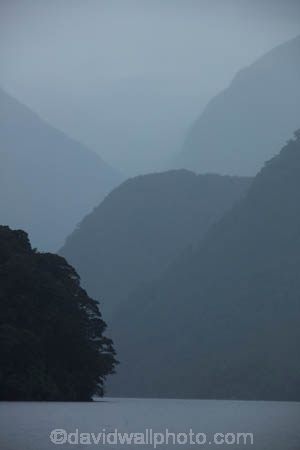 bad-weather;black-cloud;black-clouds;bluff;bluffs;cliff;cliffs;cloud;clouds;cloudy;dark-cloud;dark-clouds;Doubtful-Sound;fiord;Fiordland;Fiordland-N.P.;Fiordland-National-Park;Fiordland-NP;fiords;fjord;fjords;flooded-glacial-valley;glacial-valley;glaciated-valley;gray;gray-cloud;gray-clouds;grey;grey-cloud;grey-clouds;monochromatic;monochrome;N.Z.;national-park;national-parks;New-Zealand;NZ;Patea;rain;rain-cloud;rain-clouds;raining;rainy;S.I.;SI;South-IS;South-Island;Southland;Sth-Is;Te-Waipounamu;Te-Waipounamu-World-Heritage-Site;tonal;tone;tones;UN-world-heritage-area;UN-world-heritage-site;UNESCO-World-Heritage-area;UNESCO-World-Heritage-Site;united-nations-world-heritage-area;united-nations-world-heritage-site;weather;world-heritage;world-heritage-area;world-heritage-areas;World-Heritage-Park;World-Heritage-site;World-Heritage-Sites