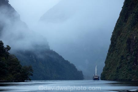 bad-weather;black-cloud;black-clouds;bluff;bluffs;boat;boats;cliff;cliffs;cloud;clouds;cloudy;cruise;cruise-boat;cruise-boats;cruises;dark-cloud;dark-clouds;Doubtful-Sound;fiord;Fiordland;Fiordland-N.P.;Fiordland-National-Park;Fiordland-NP;fiords;Fiordland-Navigator;fjord;fjords;flooded-glacial-valley;glacial-valley;glaciated-valley;gray;gray-cloud;gray-clouds;grey;grey-cloud;grey-clouds;Hall-Arm;monochromatic;monochrome;N.Z.;national-park;national-parks;New-Zealand;NZ;Patea;pleasure-boat;pleasure-boats;rain;rain-cloud;rain-clouds;raining;rainy;Real-Journeys;S.I.;SI;South-IS;South-Island;Southland;Sth-Is;Te-Waipounamu;Te-Waipounamu-World-Heritage-Site;tonal;tone;tones;tour-boat;tour-boats;tourism;tourist-boat;tourist-boats;UN-world-heritage-area;UN-world-heritage-site;UNESCO-World-Heritage-area;UNESCO-World-Heritage-Site;united-nations-world-heritage-area;united-nations-world-heritage-site;weather;world-heritage;world-heritage-area;world-heritage-areas;World-Heritage-Park;World-Heritage-site;World-Heritage-Sites