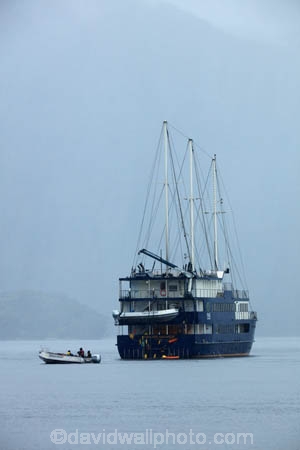 bad-weather;black-cloud;black-clouds;boat;boats;cloud;clouds;cloudy;cruise;cruise-boat;cruise-boats;cruises;dark-cloud;dark-clouds;Doubtful-Sound;fiord;Fiordland;Fiordland-N.P.;Fiordland-National-Park;Fiordland-Navigator;Fiordland-NP;fiords;fjord;fjords;gray;gray-cloud;gray-clouds;grey;grey-cloud;grey-clouds;IRB;N.Z.;national-park;national-parks;New-Zealand;NZ;Patea;pleasure-boat;pleasure-boats;rain;rain-cloud;rain-clouds;raining;rains;rainy;Real-Journeys;RHIB;RIB;rigid-inflatable-boat;S.I.;SI;South-IS;South-Island;Southland;Sth-Is;Te-Waipounamu;Te-Waipounamu-World-Heritage-Site;tour-boat;tour-boats;tourism;tourist-boat;tourist-boats;UN-world-heritage-area;UN-world-heritage-site;UNESCO-World-Heritage-area;UNESCO-World-Heritage-Site;united-nations-world-heritage-area;united-nations-world-heritage-site;weather;world-heritage;world-heritage-area;world-heritage-areas;World-Heritage-Park;World-Heritage-site;World-Heritage-Sites