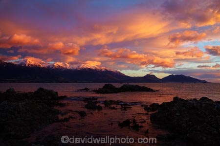 alpenglo;alpenglow;alpine;alpinglo;alpinglow;break-of-day;calm;cloud;clouds;coast;coastal;coastline;coastlines;coasts;color;colors;colour;colours;dawn;dawning;daybreak;first-light;Kaikoura;Kaikoura-Coast;Kaikoura-Range;Kaikoura-Ranges;Marlborough;morning;mountain;mountainous;mountains;mt;New-Zealand;NZ;ocean;oceans;orange;Pacific-Ocean;pink;placid;quiet;reflected;reflection;reflections;S.I.;sea;seas;Seaward-Kaikoura-Range;Seaward-Kaikoura-Ranges;serene;shore;shoreline;shorelines;shores;smooth;snow;snow-capped;snowy;South-Is;South-Island;Sth-Is;still;sunrise;sunrises;sunup;tranquil;twilight;water