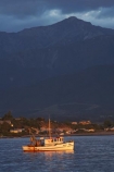 boat;boats;calm;calmness;coast;coastal;coastline;coastlines;coasts;dawn;early-light;early-morning;fishing-boat;fishing-boats;Kaikoura;Kaikoura-Coast;Marlborough;N.Z.;New-Zealand;NZ;ocean;oceans;Pacific-Ocean;S.I.;sea;Seaward-Kaikoura-Range;Seaward-Kaikoura-Ranges;shore;shoreline;shorelines;shores;SI;South-Island;still;stillness;water