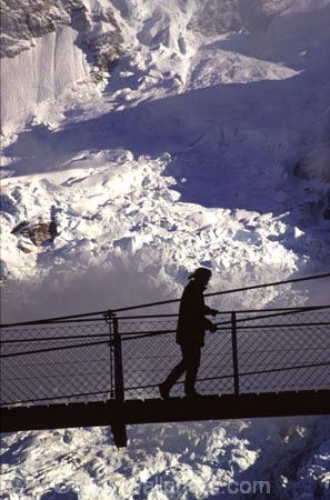 ice;snow;silhouette;swing-bridge;wire-bridge;wilderness;mountain;mountains;peak;glacier;glaciers;southern-alps;main-divide;walk;walks;walker;walking;tramp;tramps;tramper;tramping;bridges;adventure;person;people