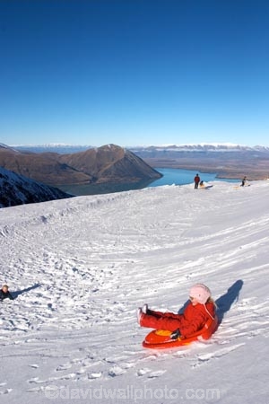 ben-ohau;child;childhood;children;cold;color;colors;colour;colours;effort;fast;fine;friction;fun;girl;girls;gravity;hood;hooded;lake;mackenzie-country;movement;new-zealand;ohau;ohau-range;plastic;play;playing;pleasure;red;sled;sledding;sledge;sledges;sledging;sleds;slide;slipping;slope;snow;snowy;south-island;speed;speeding;speeds;success;sunny;tobaganing;tobagganing;tobogan;tobogans;toboggan;toboggans;waitaki-district;winter