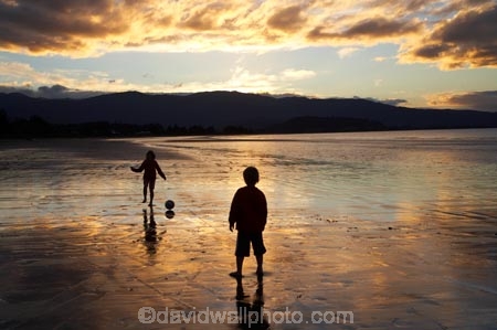 ball;barefoot;beach;beaches;calm;child;children;coast;coastal;coastline;dusk;evening;fit;fitness;football;Golden-Bay;health;healthy;model-released;N.Z.;Nelson-Region;New-Zealand;nightfall;NZ;orange;people;person;placid;play;playing;Pohara;Pohara-Beach;quiet;reflection;reflections;S.I.;sand;sandy;serene;shore;shoreline;SI;silhouette;silhouettes;sky;smooth;soccer;South-Is.;South-Island;still;sunset;sunsets;Takaka;tranquil;twilight;water;wellbeing