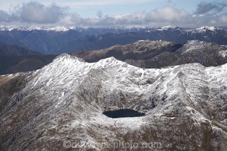 aerial;aerial-photo;aerial-photograph;aerial-photographs;aerial-photography;aerial-photos;aerial-view;aerial-views;aerials;alp;alpine;alps;altitude;Clark-Peak;high-altitude;Kahurangi-N.P.;Kahurangi-National-Park;Kahurangi-NP;Lake-Clara;lakes;mount;mountain;mountain-peak;mountainous;mountains;mountainside;mt;mt.;N.Z.;national-park;national-parks;Nelson-Region;New-Zealand;NZ;peak;peaks;range;ranges;S.I.;SI;snow;snow-capped;snow_capped;snowcapped;snowy;South-Is.;South-Island;summit;summits