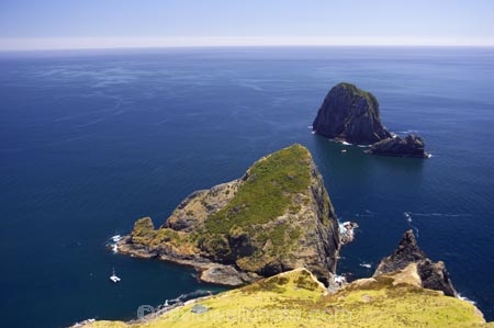 aerial;aerials;bay;bay-of-islands;bays;beautiful;cape-brett;cliff;coast;coastal;coastline;hole-in-the-rock;is;island;motukokako-island;natural;nature;new-zealand;north-is.;north-island;north-islands;northland;ocean;piercy-island;rugged;sand;scenic;sea;shore;shoreline;travel;water;waterside