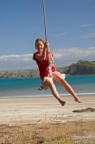 10-year-old;10-years-old;9-year-old;9-years-old;Auckland-Region;beach;beaches;child;children;coast;coastal;coastline;coastlines;coasts;foreshore;fun;girl;girls;happy;joy;kid;kids;kiwi-icon;kiwi-icons;kiwiana;little-girl;little-girls;N.I.;N.Z.;New-Zealand;NI;nine-year-old;nine-years-old;North-Is;North-Is.;North-Island;Northland;NZ;Oakura;Oakura-Bay;ocean;oceans;outdoor;outside;people;person;play;playing;rope-swing;rope-swings;sand;sandy;sea;seas;shore;shoreline;shorelines;shores;sky;summer;summertime;swing;swinging;swings;ten-year-old;ten-years-old;water;Whangaruru-Bay;young-girl;young-girls