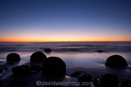 beach;beaches;boulder;break-of-day;calm;coast;coastal;coastline;coastlines;coasts;concretion;dawn;dawning;daybreak;first-light;formation;geological;geology;marble;marbles;Moeraki;Moeraki-Boulder;Moeraki-Boulders;morning;N.Z.;New-Zealand;North-Otago;NZ;ocean;Otago;placid;quiet;reflection;reflections;rock;rocks;round;S.I.;sand;sea;sedementary;serene;shore;shoreline;shorelines;shores;SI;smooth;South-Island;sphere;still;sunrise;sunrises;sunup;tranquil;twilight;Waikati-District;Waitaki-District;water