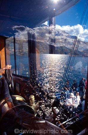 steam;ship;ships;steamships;steam-ship;steam-ships;steamship;steamer;steamers;mountain;mountains;lakes;lake;boat;boats;tourists;tourist;tourism;tourist-attraction;tourist-attractions;earnslaw;tss-earnslaw;t.s.s.-earnslaw;queenstown;wakatipu;lake-wakatipu;south-island;new-zealand;reflection;reflections;window;windows;sunlight