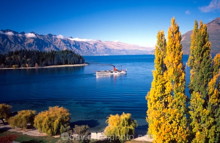 steam;ship;ships;steamship;steamships;steamer;steamers;mountain;mountains;autumn;fall;lake;lakes;boat;boats;tourists;tourist;tourism;resort-town;lake-wakatipu;wakatipu;queenstown;south-island;new-zealand;remarkables;the-remarkables;poplar;poplars;tree;trees;excursion;holiday;holidays;vacation;vacations;earnslaw;historic;historical;history;yellow;leaves;colours