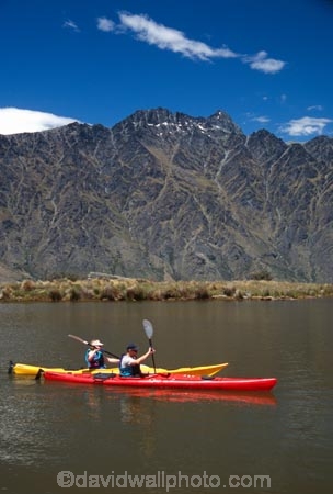 kayak;kayaks;kayaker;kayakers;water;paddle;paddler;paddlers;paddling;paradise;beautiful;lakes;lake;adventure;adventure-tourism;recreation;outdoors;outdoor;outside;relax;relaxing;yellow;boat;pristine;summer;holiday;holidays;vacation;vacations;deer-park-heights;deer-park;the-remarkables;remarkables;queenstown;south-island;new-zealand;tarn;tarns;pond;ponds;sea-kayak;sea-kayaks;red;two;pair;mountain;mountains