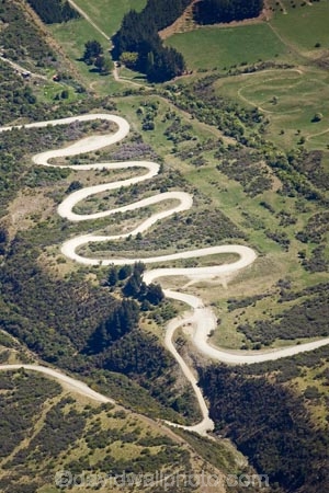 aerial;aerial-photo;aerial-photography;aerial-photos;aerial-view;aerial-views;aerials;bend;bends;corner;corners;countryside;curve;curves;dusty;gravel-road;gravel-roads;metal-road;metal-roads;metalled-road;metalled-roads;N.Z.;New-Zealand;NZ;Otago;Queenstown;Remarkables;Remarkables-Ski-Field;road;roads;rural;S.I.;sharp-bend;sharp-bends;SI;South-Is.;South-Island;Southern-Lakes;Southern-Lakes-District;Southern-Lakes-Region;steep;The-Remarkables;zig-zag;zig_zag;zigzag;Zigzag-Road