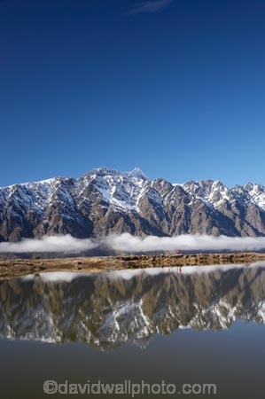 alpine;alpine-lake;alpine-lakes;alpine-tarn;alpine-tarns;altitude;calm;children;cloud;clouds;Deer-Park-Heights;families;family;fog;foggy;fogs;high-altitude;lake;lakes;mist;mists;misty;mount;mountain;mountain-peak;mountainous;mountains;mountainside;mt;mt.;N.Z.;New-Zealand;NZ;Otago;peak;peaks;Peninsula-Hill;people;person;placid;Queenstown;quiet;range;ranges;reflection;reflections;Region;Remarkables;S.I.;season;seasonal;seasons;serene;SI;smooth;snow;snow-capped;snow_capped;snowcapped;snowy;South-Is;South-Is.;South-Island;Southern-Lakes;Southern-Lakes-District;Southern-Lakes-Region;still;summit;Summit-Tarn;summits;tarn;tarns;The-Remarkables;tranquil;walker;walkers;water;winter
