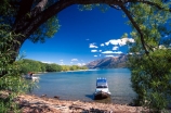 Glenorchy;Central-Otago;Lake-Wakatipu;Wakatipu;lake;water;blue;green;shore;tree;trees;boat;boats;boating;mountain;mountains;bay;hang;hanging;branch;arc;arch;holiday;tourism;holidays
