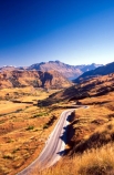 wakatipu-basin;wakatipu;Queenstown;south-island;new-zealand;road;roads;transport;summer;grass;golden;mountain;mountains;hill;hills;uphill;steep;hot;dry
