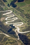aerial;aerial-photo;aerial-photography;aerial-photos;aerial-view;aerial-views;aerials;bend;bends;corner;corners;countryside;curve;curves;dusty;gravel-road;gravel-roads;metal-road;metal-roads;metalled-road;metalled-roads;N.Z.;New-Zealand;NZ;Otago;Queenstown;Remarkables;Remarkables-Ski-Field;road;roads;rural;S.I.;sharp-bend;sharp-bends;SI;South-Is.;South-Island;Southern-Lakes;Southern-Lakes-District;Southern-Lakes-Region;steep;The-Remarkables;zig-zag;zig_zag;zigzag;Zigzag-Road
