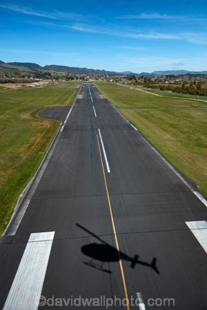 aerial;aerial-image;aerial-images;aerial-photo;aerial-photograph;aerial-photographs;aerial-photography;aerial-photos;aerial-view;aerial-views;aerials;airfield;airfields;airport;airports;airstrip;Bay-of-Plenty-Region;helicopter;helicopters;Lake-Rotorua;N.I.;N.Z.;New-Zealand;NI;North-Is;North-Island;Nth-Is;NZ;Rotorua;Rotorua-Airport;Runway;runways;shadow;shadows;tarmac