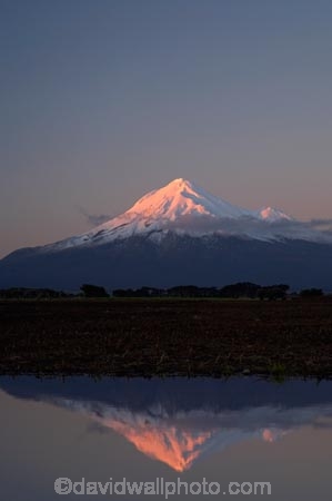 alpenglo;alpenglow;alpine;alpinglo;alpinglow;calm;color;colors;colour;colours;Egmont-N.P.;Egmont-National-Park;Egmont-NP;Mount-Egmont;Mount-Taranaki;Mount-Taranaki-Egmont;Mountain;mountainous;mountains;mt;Mt-Egmont;Mt-Taranaki;Mt-Taranaki-Egmont;mt.;Mt.-Egmont;Mt.-Taranaki;Mt.-Taranaki-Egmont;N.I.;N.Z.;New-Zealand;NI;North-Is;North-Is.;North-Island;NZ;Opunake;pink;placid;quiet;reflection;reflections;season;seasonal;seasons;serene;smooth;snow;still;Taranaki;tranquil;volcanic;volcano;volcanoes;water;winter