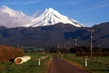 snow;winter;ice;volcano;volcanoes;mountain;mountains;snowline;snow_line;snow-line;sunrise;dawn;cloud;clouds;pink;orange;crimson;Mount-Taranaki;Mount-Egmont;taranaki;egmont;mt-taranaki;mt-egmont;mt.-taranaki;mt.-egmont;new-zealand;road;roads;transport;travel;hay-bales;bale;bales;rural;agriculture;farm;farms;farming